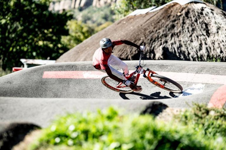 a bker taking a steep curve in a bowl