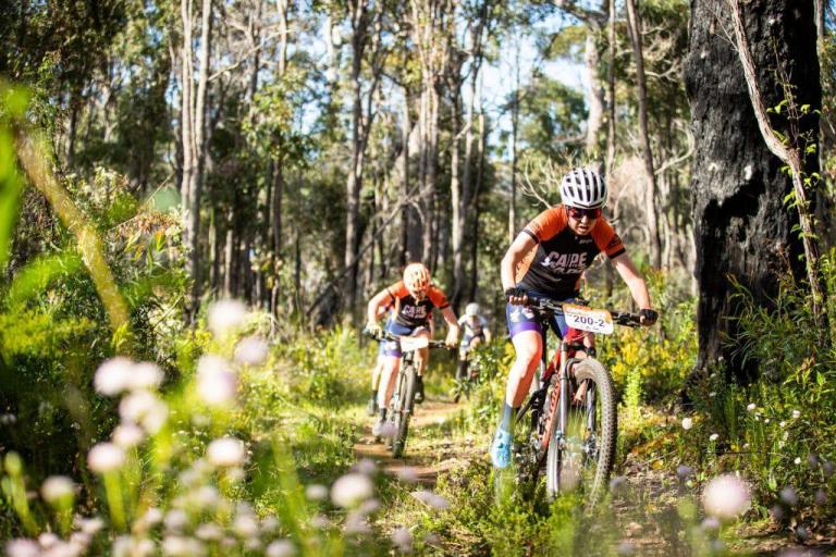 Mattocks and Beck biking in the forest